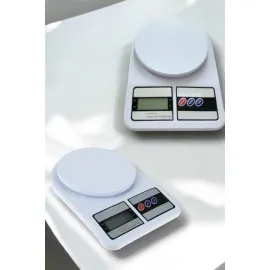 Kompakt Tasarım Ve Tek Tuşla Sıfırlama Özelliğiyle Kullanımı Kolay Mutfak Tartısı